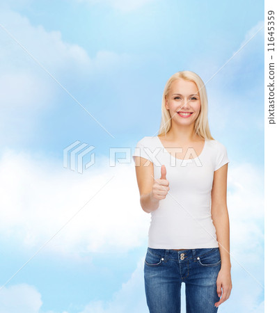 woman showing thumbs up woman showing thumbs up 11645359