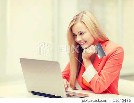 businesswoman with laptop and credit card 11645486