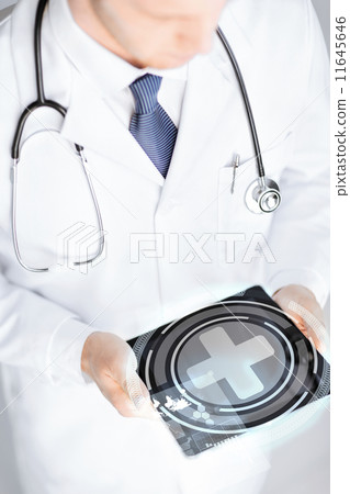 male doctor holding tablet pc with medical app 11645646