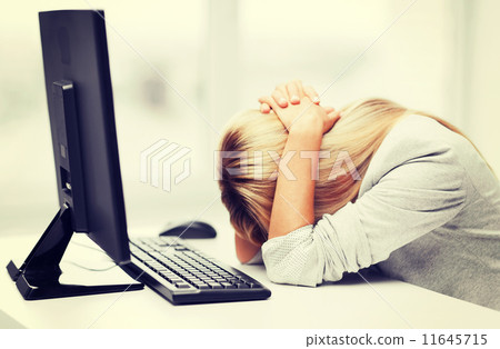stressed woman with computer stressed woman with computer 11645715