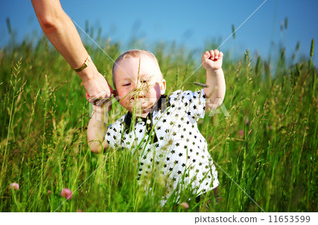 boy and mother hands boy and mother hands 11653599
