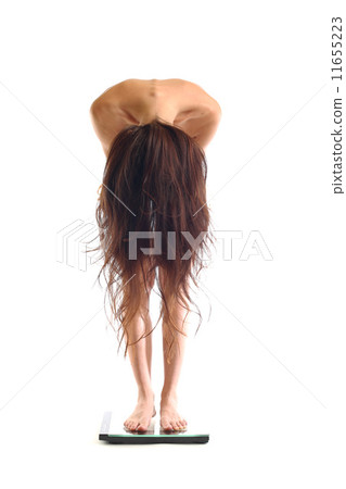 woman on scales 11655223