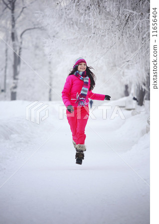 woman in winter park woman in winter park 11656404