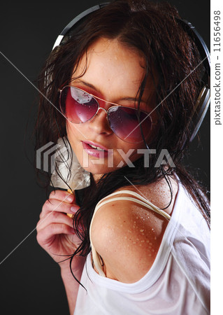 woman in phones 11656498