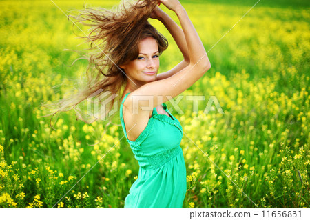 woman on oilseed field woman on oilseed field 11656831