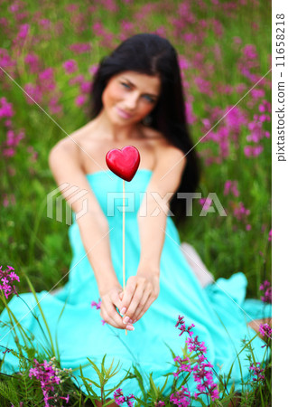 woman on summer flower field woman on summer flower field 11658218