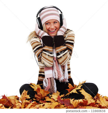autumn woman listening music 11660638