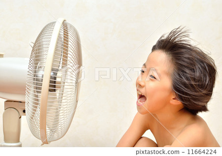 A girl cool with a fan 11664224