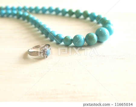 Summer accessories, turquoise stone rings and necklaces, white background 11665034