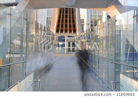 People blurred in motion on the bridge walking People blurred in motion on the bridge walking 11669668