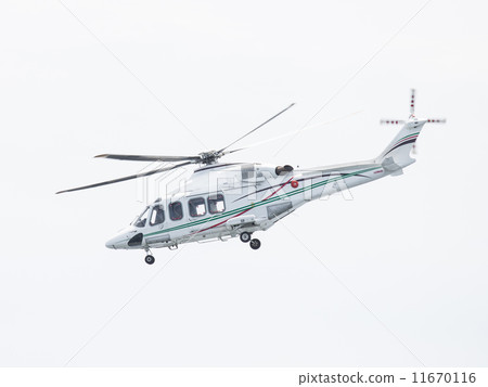 Helicopter landing on offshore oil rig 11670116