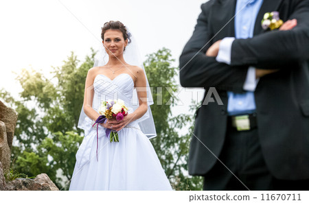 Bride with man in blur background Bride with man in blur background 11670711