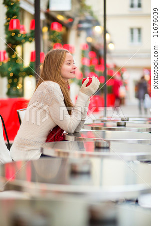 Girl in a Parisian cafe at Christmas time 11676039