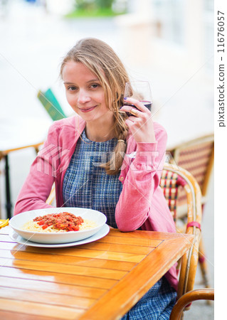 Young French woman having lunch 11676057
