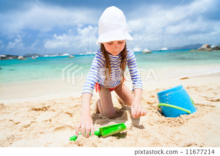 Adorable little girl at beach 11677214