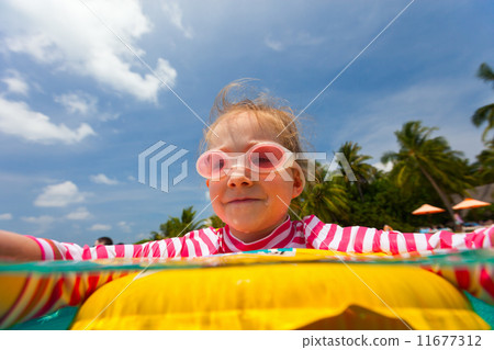Little girl at swimming pool Little girl at swimming pool 11677312