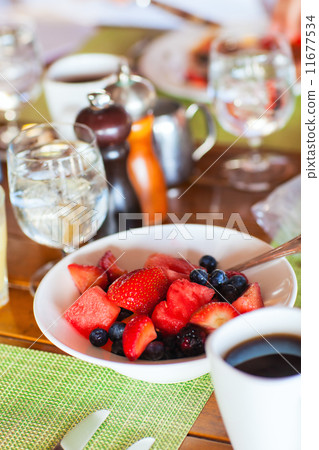 Breakfast with fresh fruits and coffee 11677534