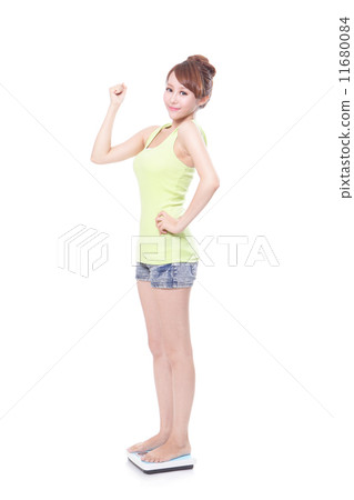 slim woman with scales 11680084