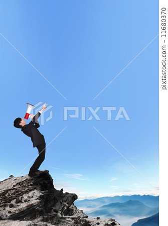 business man shouting into a megaphone 11680370