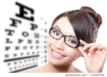 woman with glasses and eye test chart woman with glasses and eye test chart 11680398