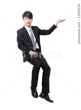 business man sitting on some thing and show copy space business man sitting on some thing and show copy space 11680554