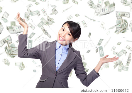 Business woman happy under money rain Business woman happy under money rain 11680652