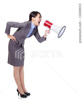 Business woman screaming in megaphone 11680653