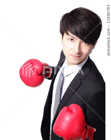 Asian businessman battle with boxing glove 11680763