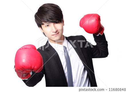 Asian businessman battle with boxing glove 11680848