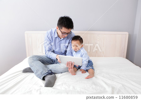 happy family using tablet pc happy family using tablet pc 11680859