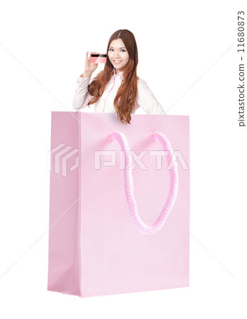 smile woman holding credit card in the shopping bag smile woman holding credit card in the shopping bag 11680873