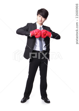 successful businessman with boxing gloves 11680908