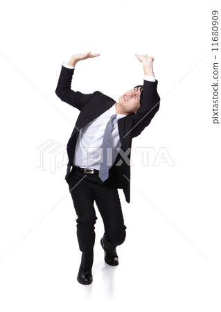 business man holding something heavy above head business man holding something heavy above head 11680909