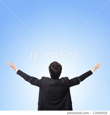 back view of business man arms up back view of business man arms up 11680916