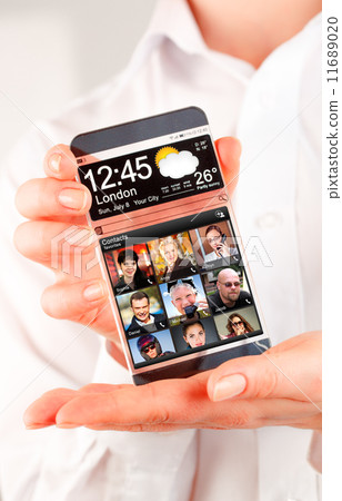Smartphone with transparent screen in human hands. Smartphone with transparent screen in human hands. 11689020