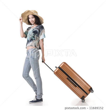 woman drag a luggage woman drag a luggage 11689152