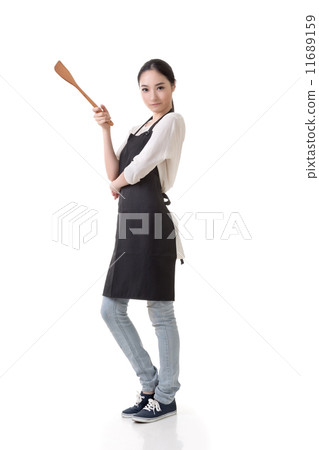 housewife hold a spatula housewife hold a spatula 11689159