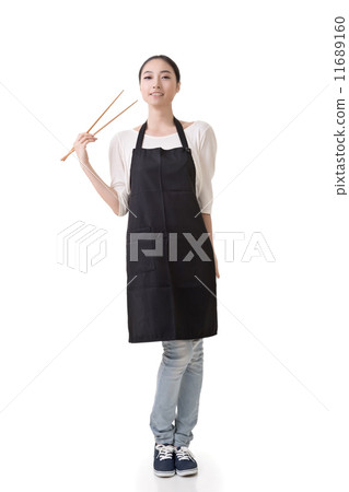 Asian housewife hold chopsticks Asian housewife hold chopsticks 11689160