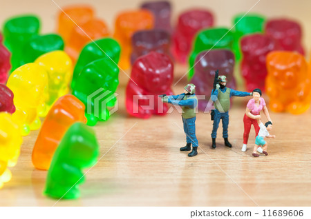 Gummy bear invasion. Harmful/ junk food concept Gummy bear invasion. Harmful/ junk food concept 11689606