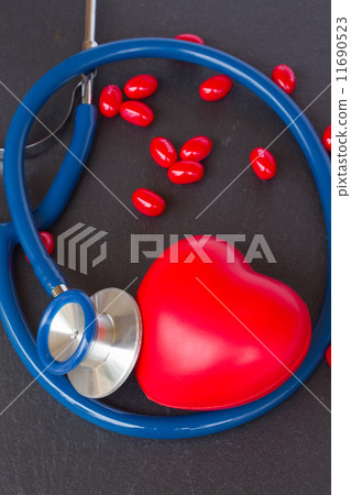 stethoscope with two red hearts and pills 11690523