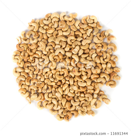 Lot of cashews on white background Lot of cashews on white background 11691344