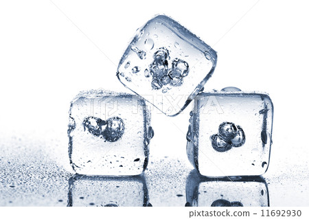 Three melting ice cubes with water dew 11692930