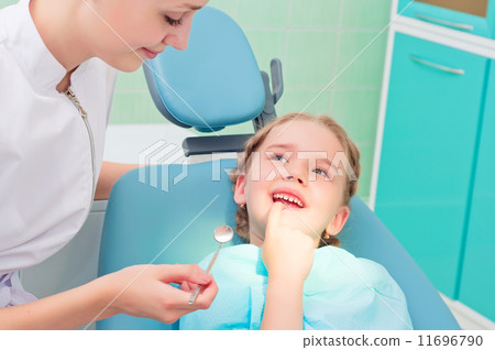 child shows the tooth dentist child shows the tooth dentist 11696790