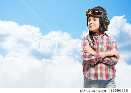 Boy in helmet pilot dreaming of becoming a pilot 11696816