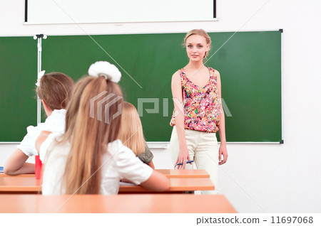 teacher and pupils in classroom teacher and pupils in classroom 11697068