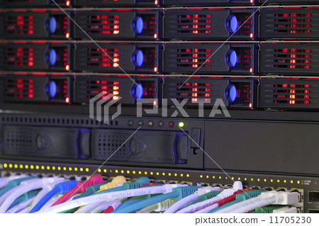 Network hub and server rack storage with connection cables and red lights 11705230
