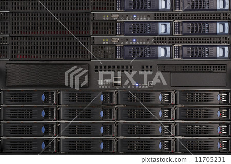 Server Blades and storage in a rack close up Server Blades and storage in a rack close up 11705231