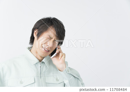 在電話嘴道歉的工人人 在電話嘴道歉的工人人 11708484