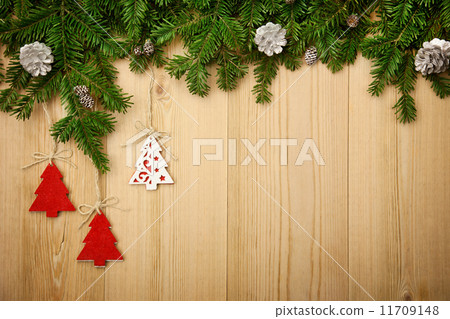 Christmas background with firtree, decorative trees and cones on 11709148