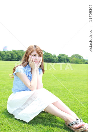 Half beautiful lazing in the park Half beautiful lazing in the park 11709365